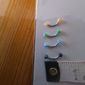 Nose, belly, eyebrow, daith, tongue rings BROW DAITH